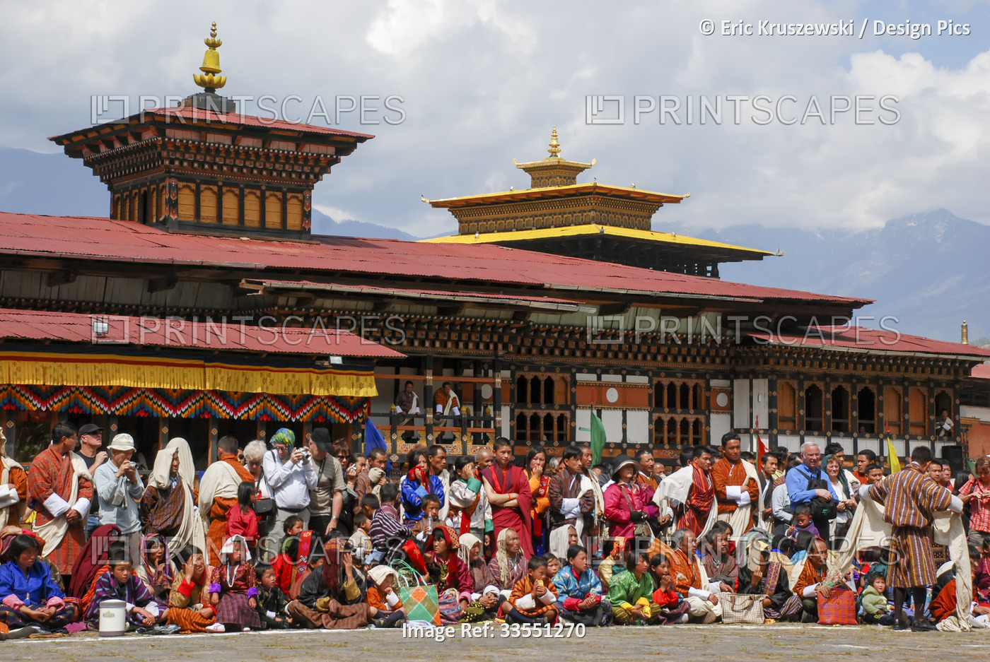 Visitors gather during the Bhutanese Paro Tshechu Festival within Paro Dzong, a ...