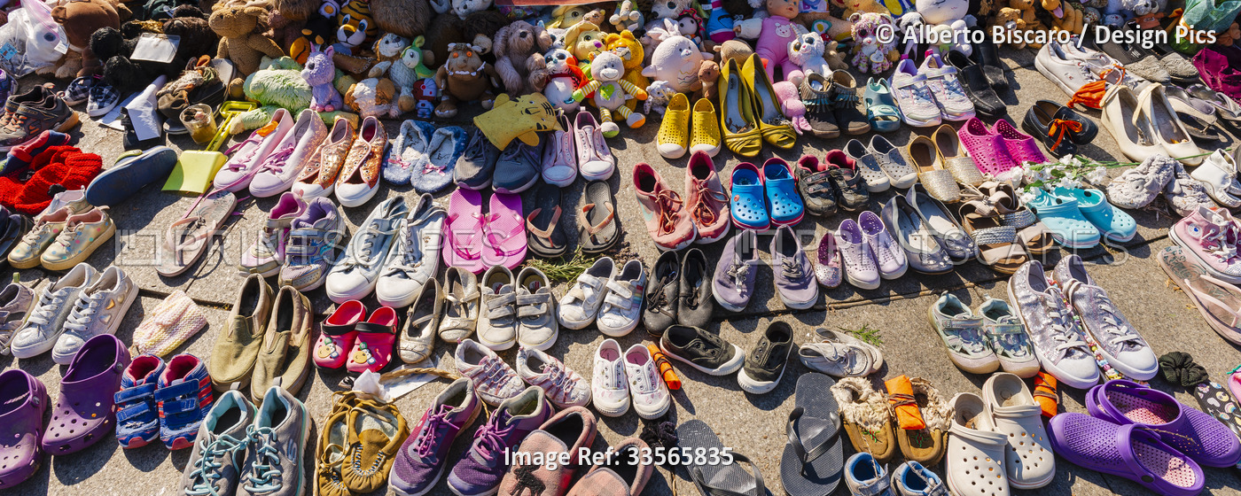 Shoes and toys left near the Centennial Flame on Parliament Hill in memory of ...