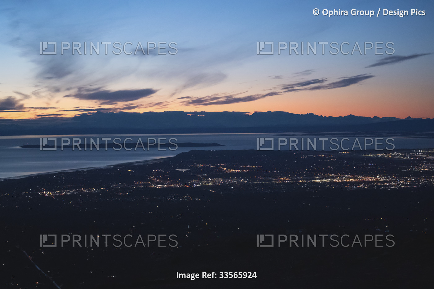 The sun sets above Mt. Susitna, or Sleeping Lady, across Cook Inlet from ...