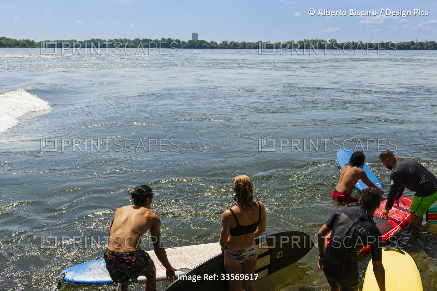 Surfing in the St. Lawrence River in Montreal; Montreal, Quebec, Canada