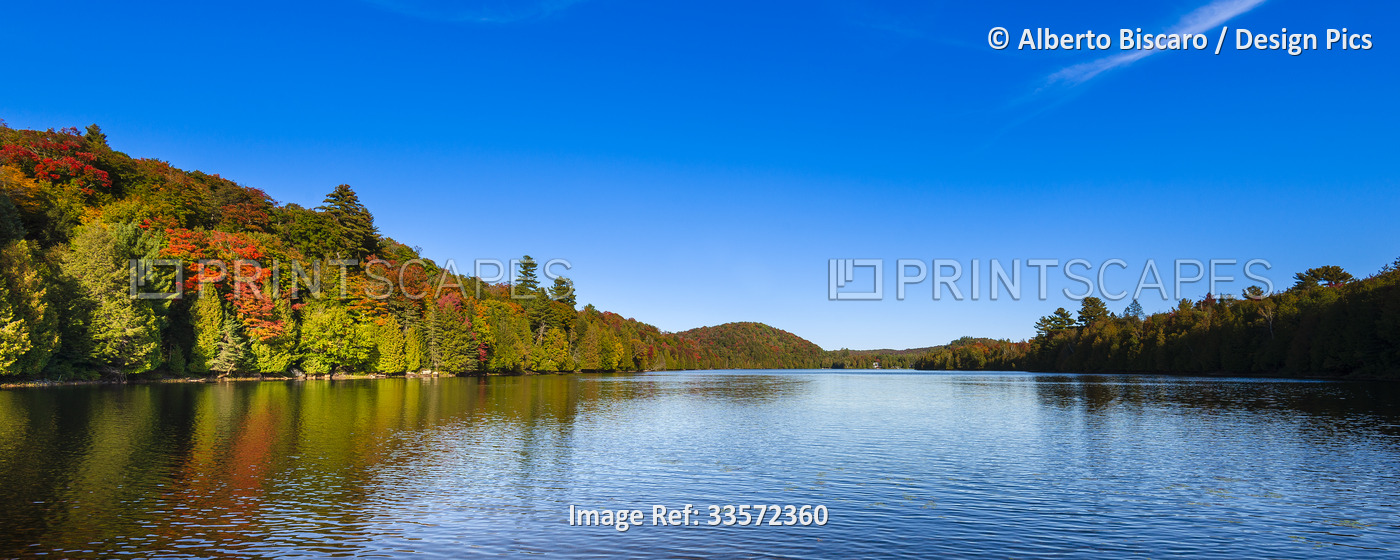Lake Tamaracouta and autumn colours in the Laurentides of Quebec; Quebec, Canada