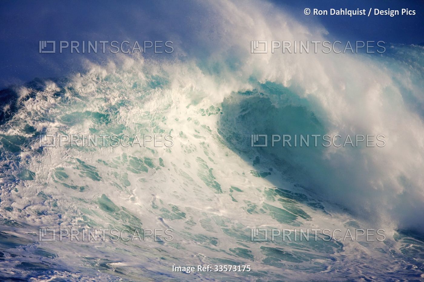 Dramatic view of wave breaking at Peahi on Maui's North Shore; Maui, Hawaii, ...