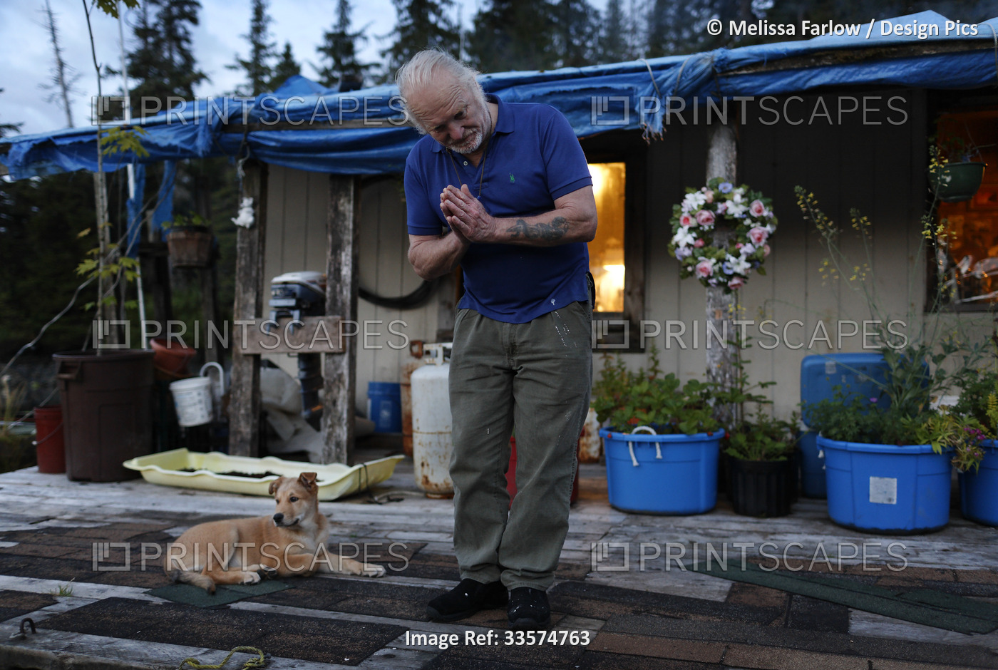 Swede, a float house owner, bows farewell to guests as they leave for the ...