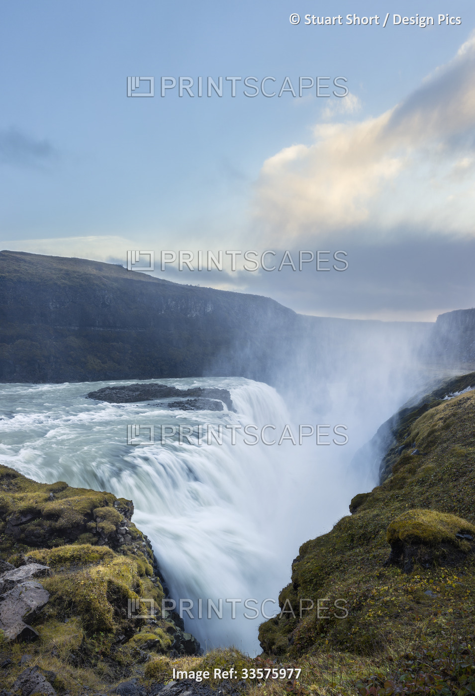 Long exposure of the lower tier of Gullfoss Falls as it empties into a huge ...