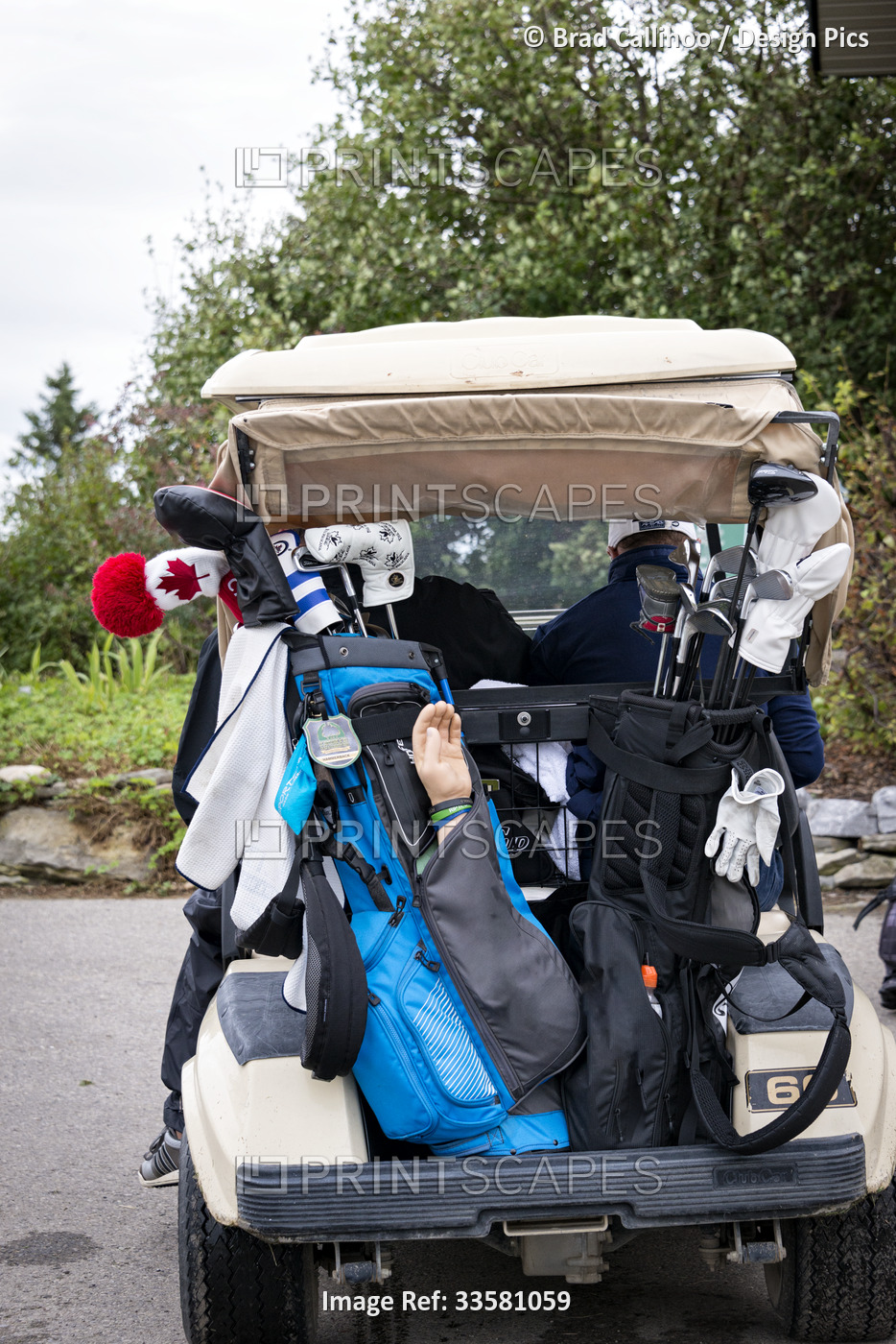 Golf cart with arm prothesis in the back; Okotoks, Alberta, Canada