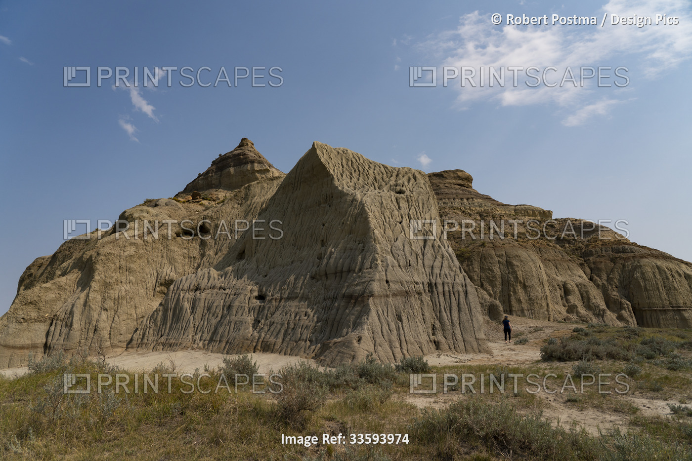 Woman hiking around Castle Butte in Big Muddy Badlands of Southern ...