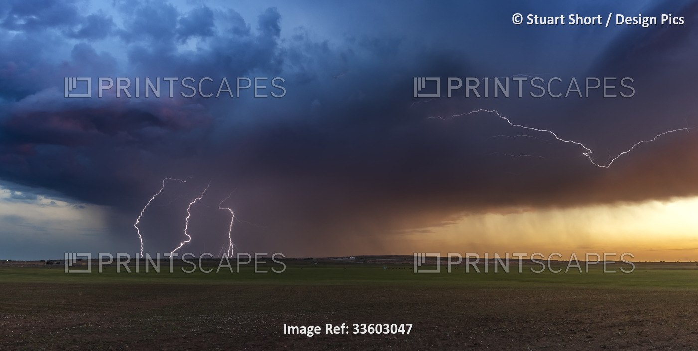 Lightning strikes from a weak airmass thunderstorm at sunset in the Texas ...