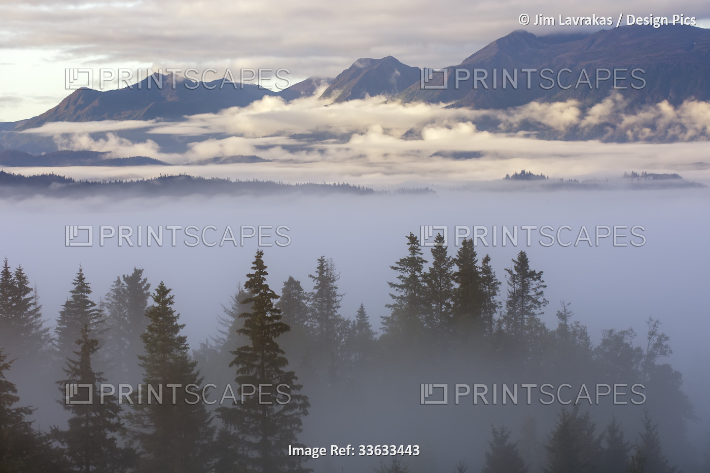 A foggy day slowly reveals Kachemak Bay, the Kenai Mountains, Cohen and Yukon ...