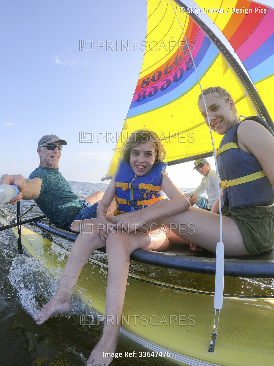 Sailing with friends on a beautiful day. This young girl has Ulrich Congenital ...