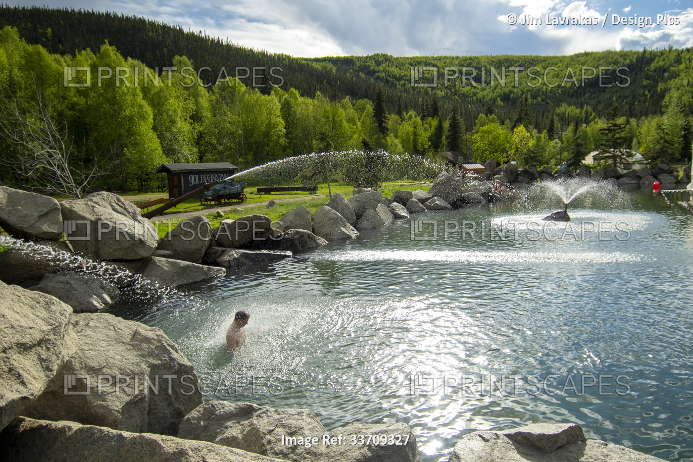 People enjoy the man-made pool at Chena Hot Springs, outside Fairbanks, Alaska; ...