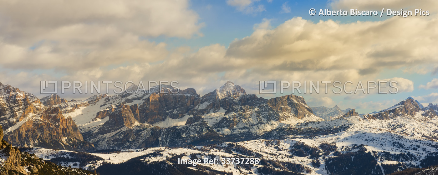 Snowy Dolomites during winter in Italy, with a view towards Tofana and Lagazuoi ...