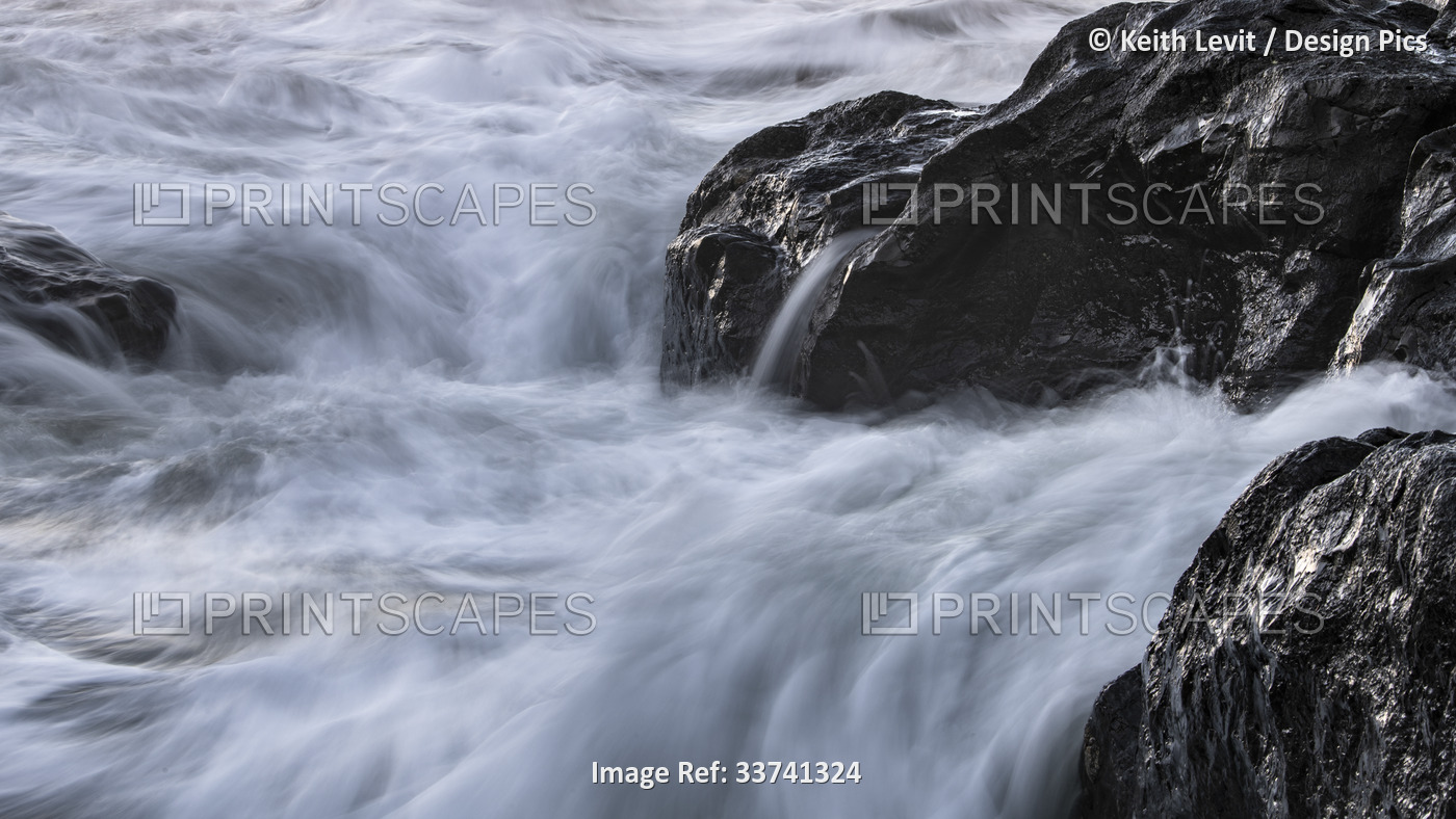 Tide water washing over rocks, Cox Bay Beach, Vancouver Island; British ...