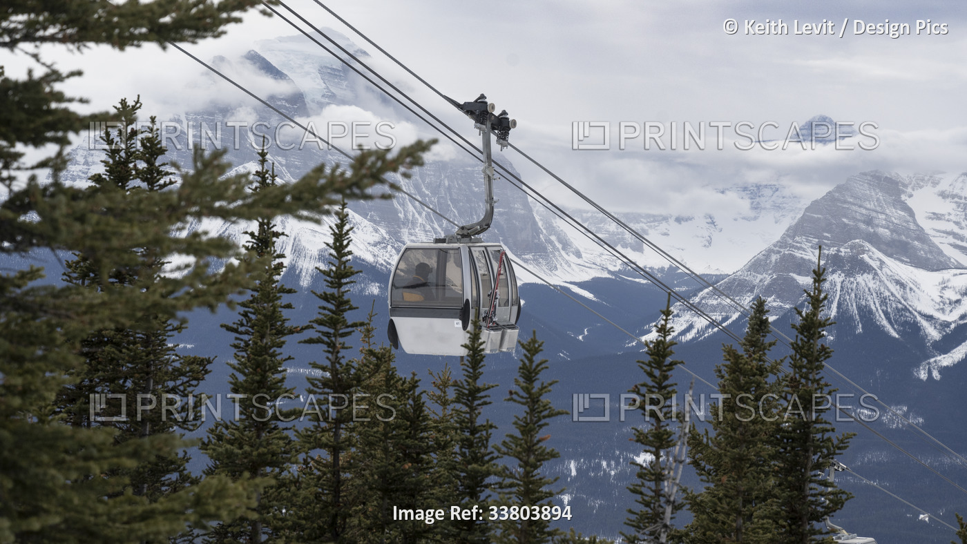 Gondola lift at a popular ski resort in Banff National Park; Improvement ...