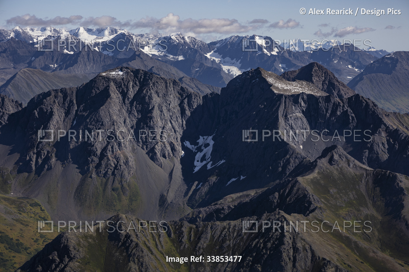 Close-up aerial view of the majestic mountain peaks of the Chugach Mountain ...