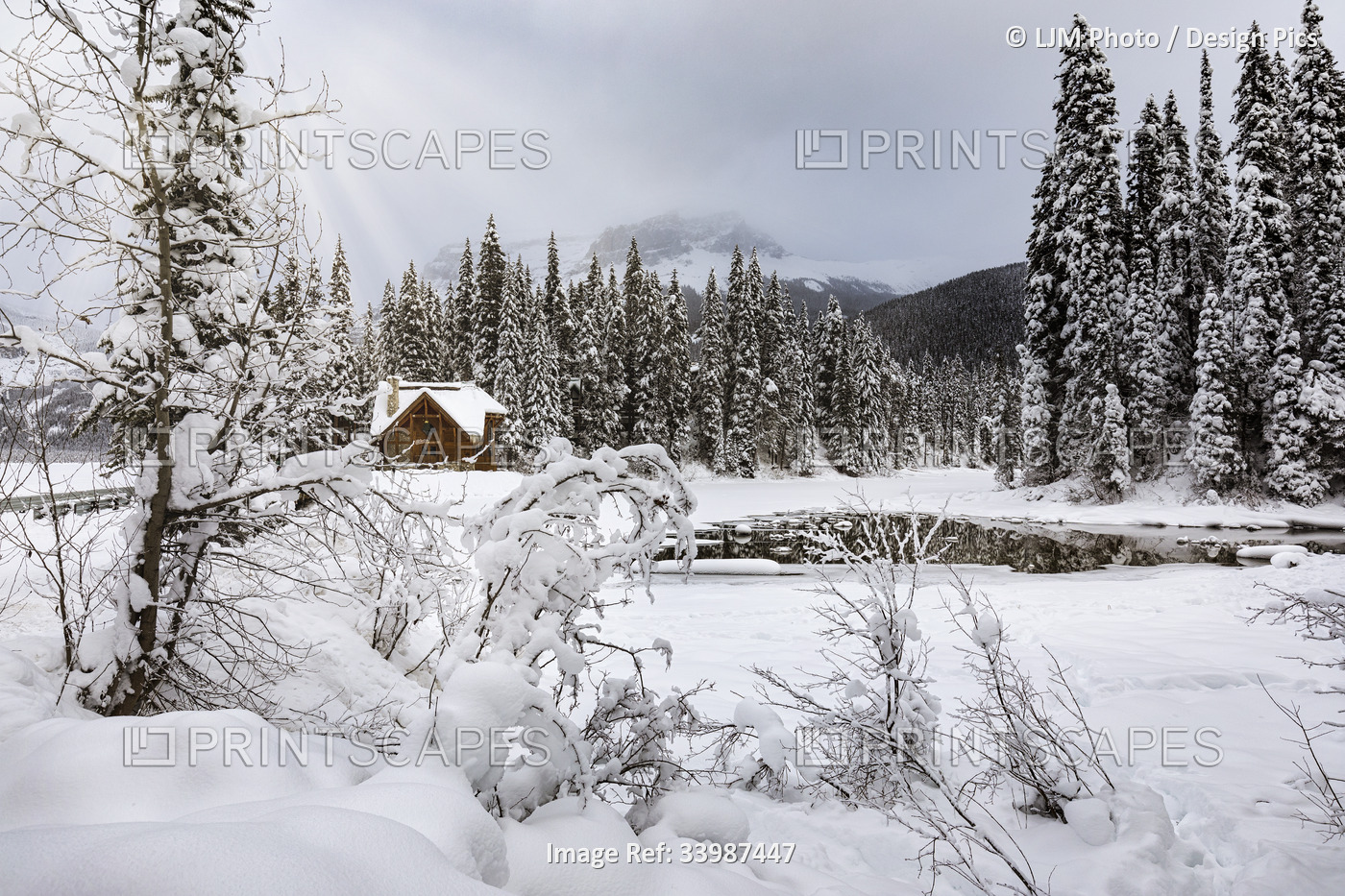 View of a lodge at Emerald Lake during the winter in Yoho National Park; ...