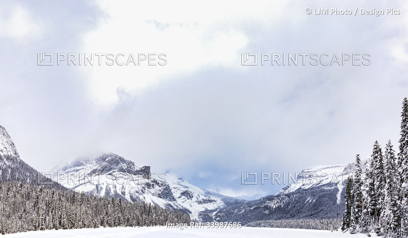 View over Emerald Lake in the winter with the Rocky Mountains in the ...