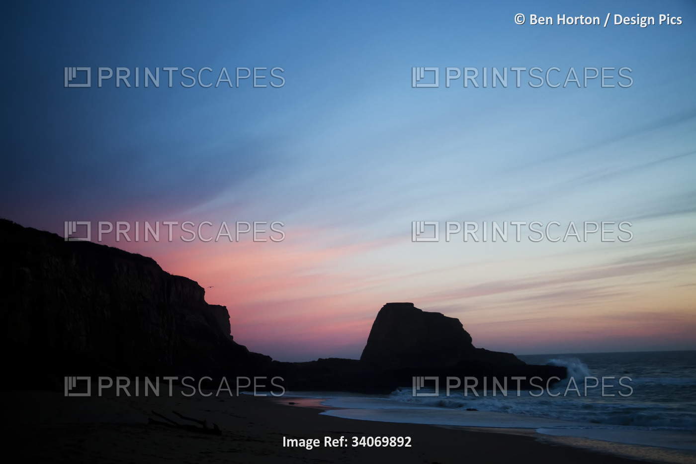 The sun sets over Panther Beach in Central California.