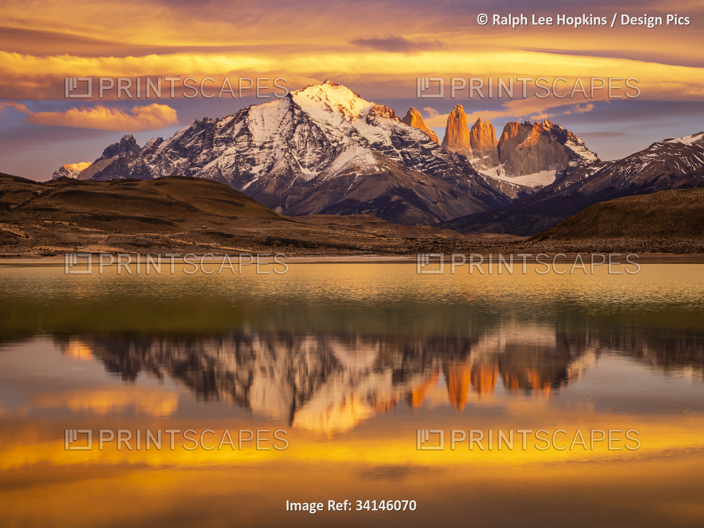 Lenticular clouds and reflection at sunrise in Lago Azul, Torres del Paine ...