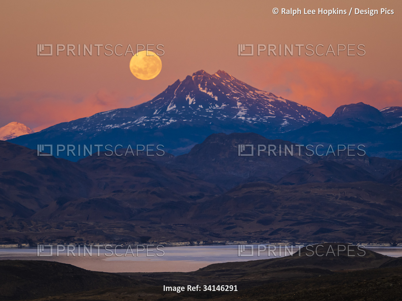Supermoon at sunrise in Torres del Paine National Park; Patagonia, Chile