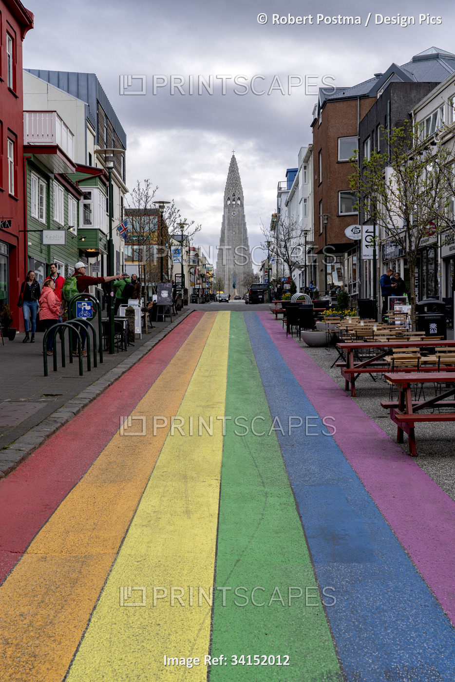 Rainbow walkway and Hallgrimskirkja Lutheran Church of Iceland in the city of ...