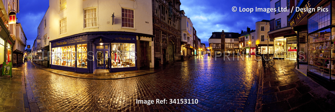 A view of the Buttermarket in Canterbury city centre at dusk.