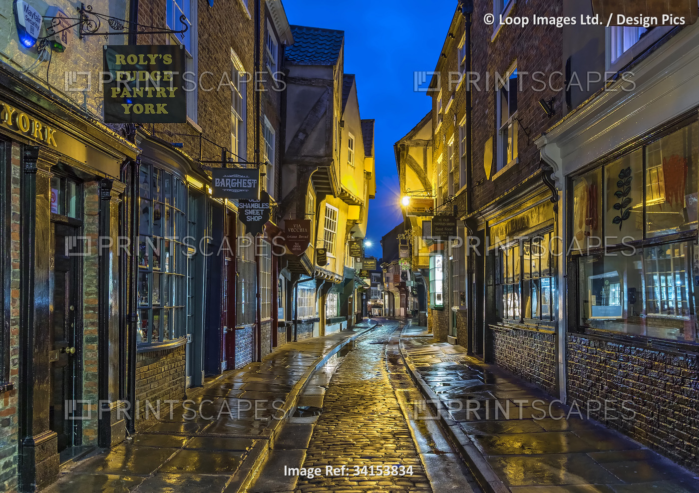 The historic medieval Shambles street at night in the city of York.