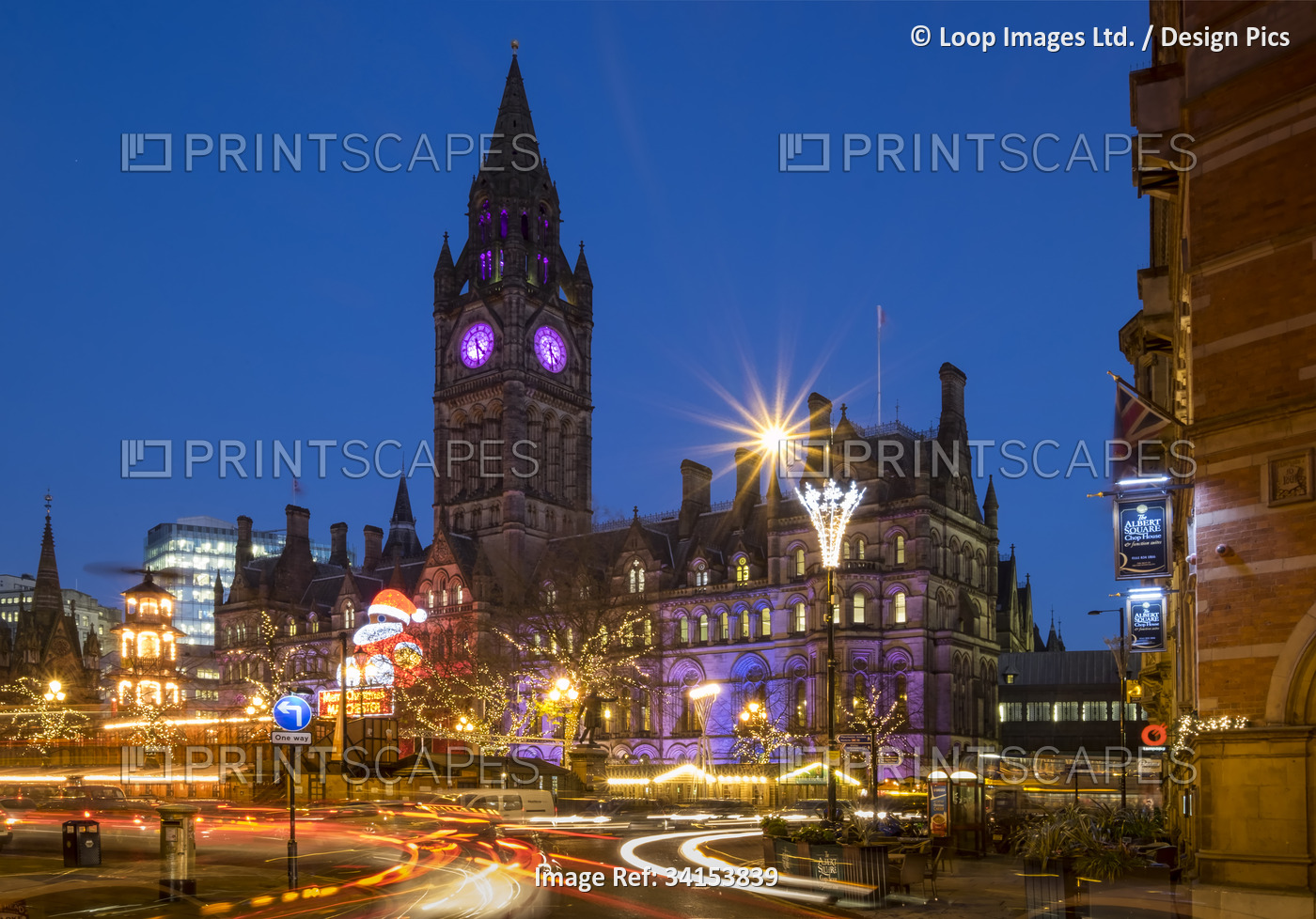 The Christmas markets and Manchester Town Hall at night.
