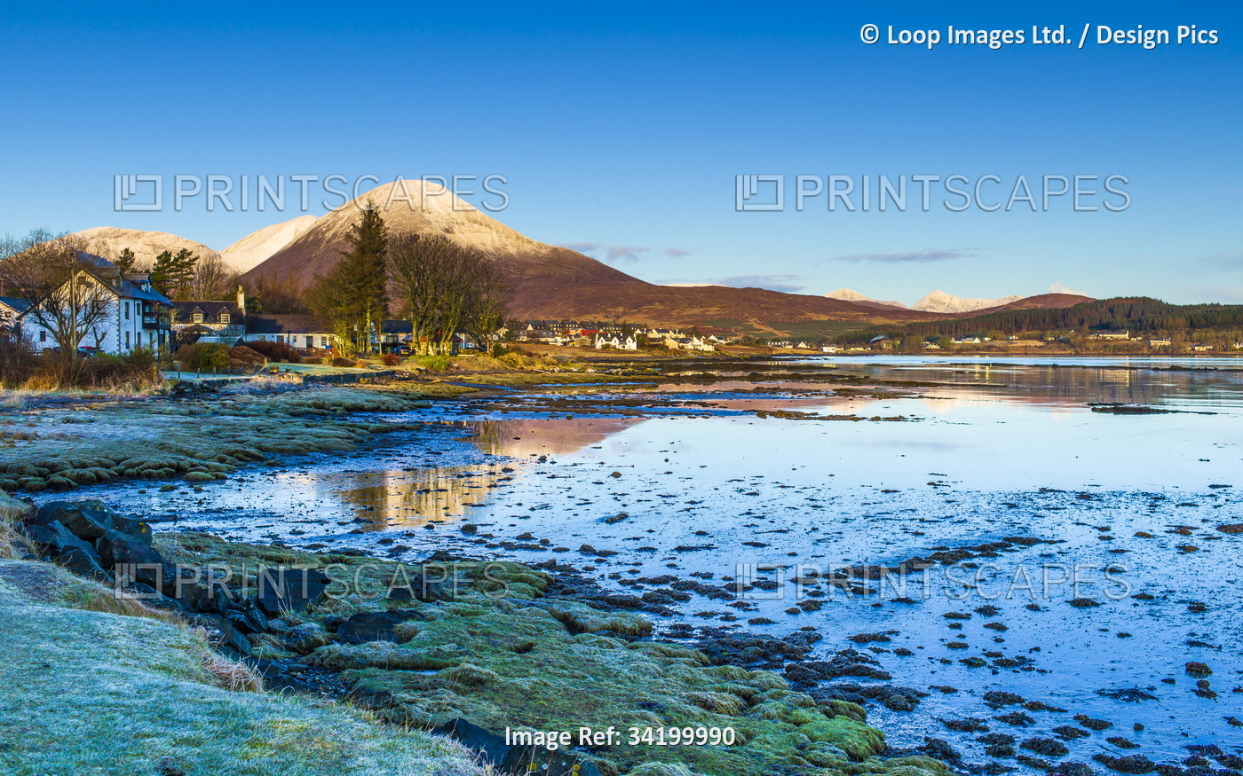 Winter sunrise at Broadford on the Isle of Skye with Beinn na Caillich behind ...