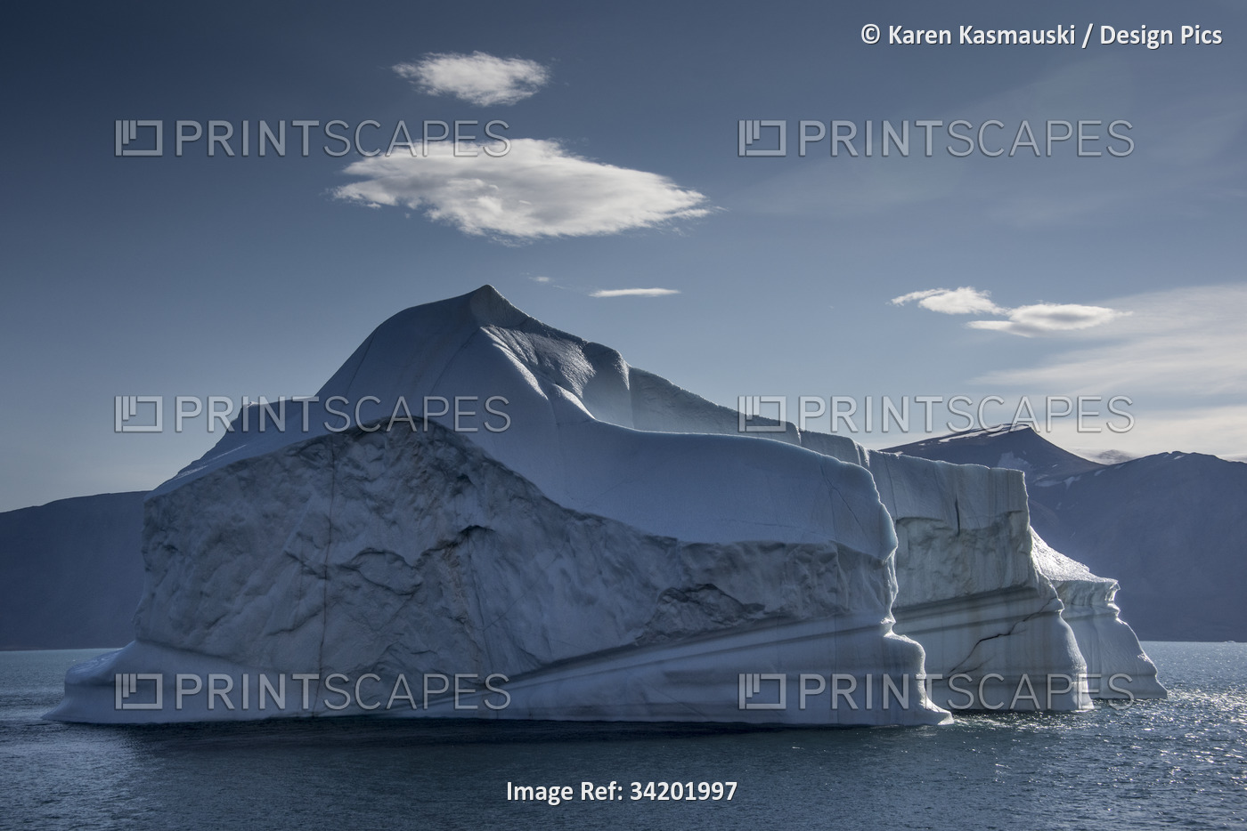 Iceberg floating on the Franz Joseph Fjord, just off the coast of Greenland; ...