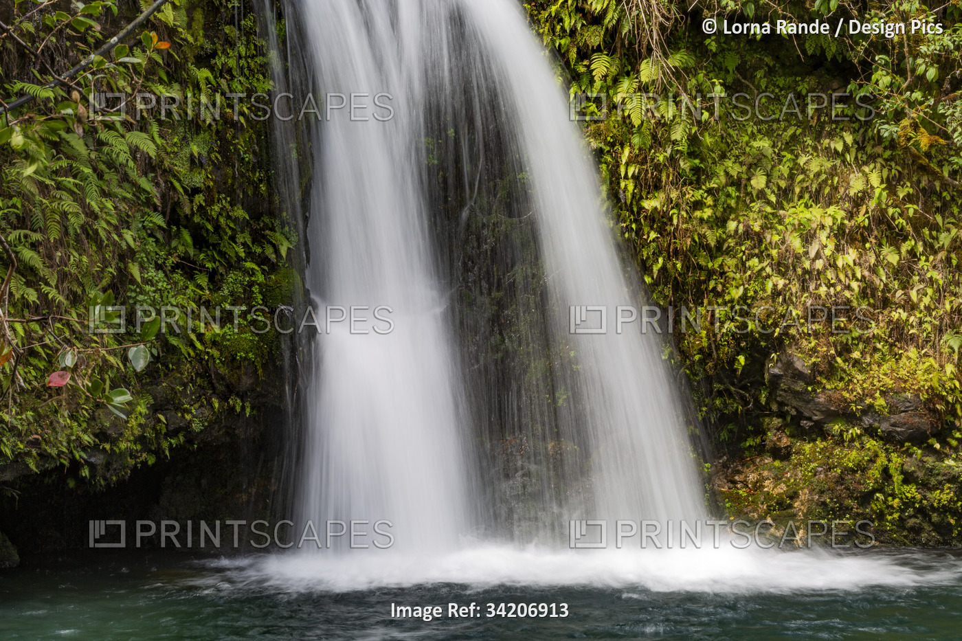 Close-up view of a cascading waterfall along the Road to Hana, scenic route; ...