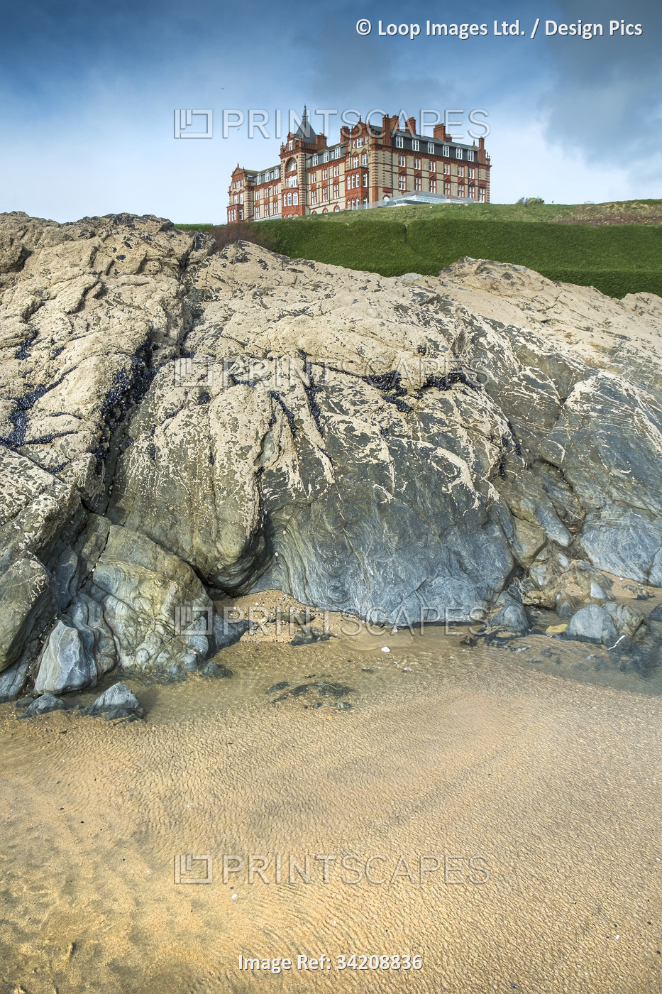 The Headland Hotel seen from the exposed beach at Fistral in Newquay in ...