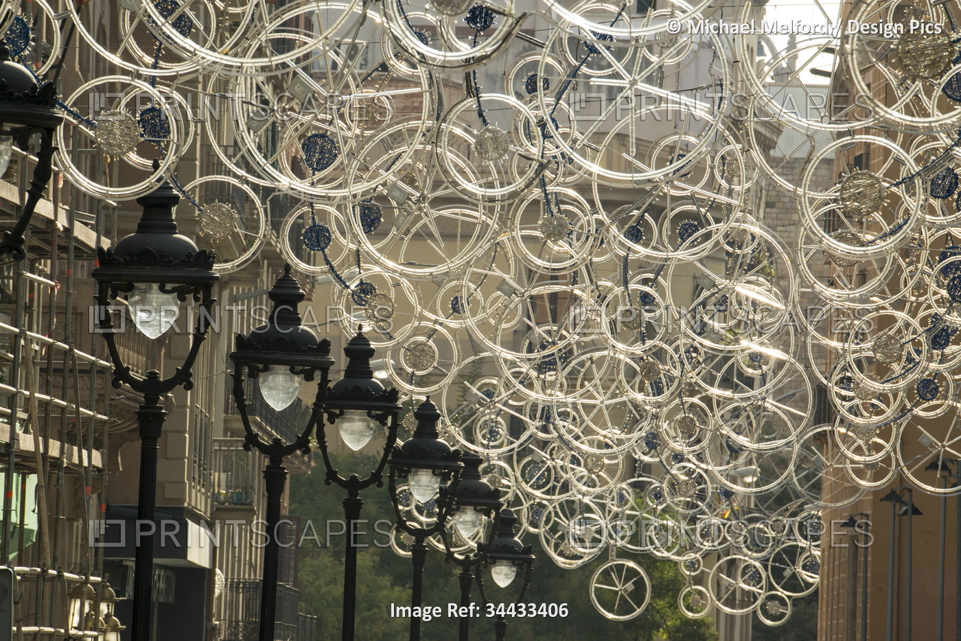 Bicycle parts turned into hanging art; Barcelona, Spain