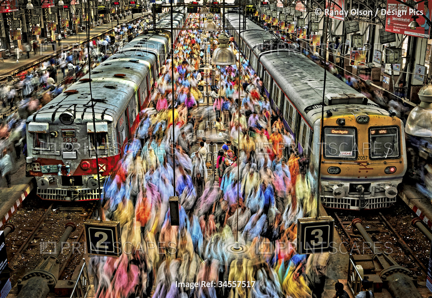 Crowds at the Churchgate Railway Station in Mumbai flow between the trains. By ...