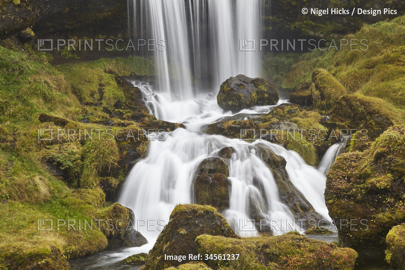 Cascades of the Hafrafell waterfall in mountains near Stykkisholmur, ...