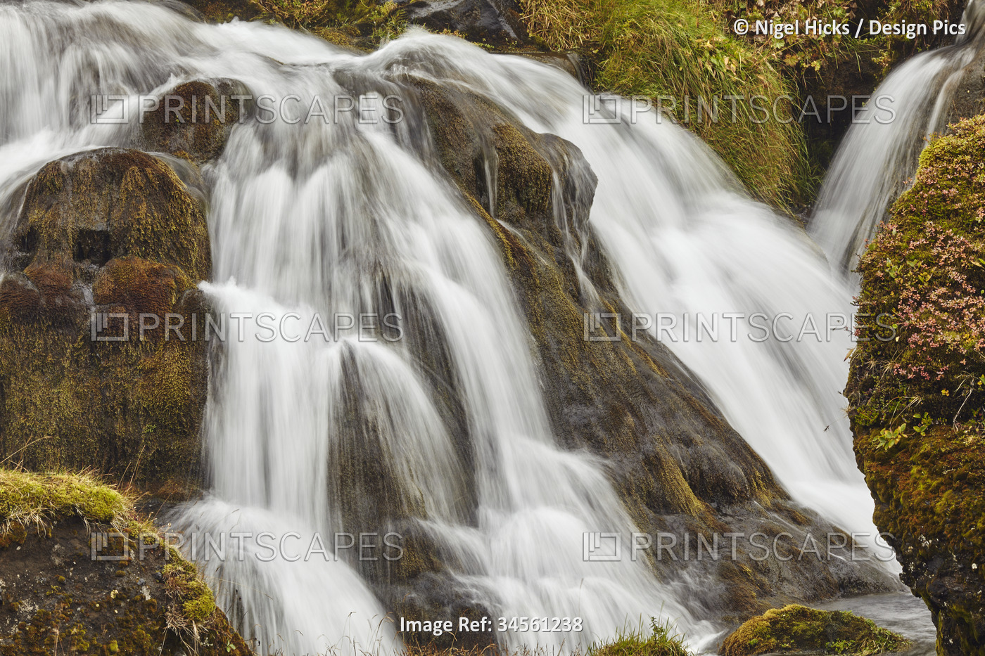 Cascades and rock of the Hafrafell waterfall in mountains near Stykkisholmur, ...