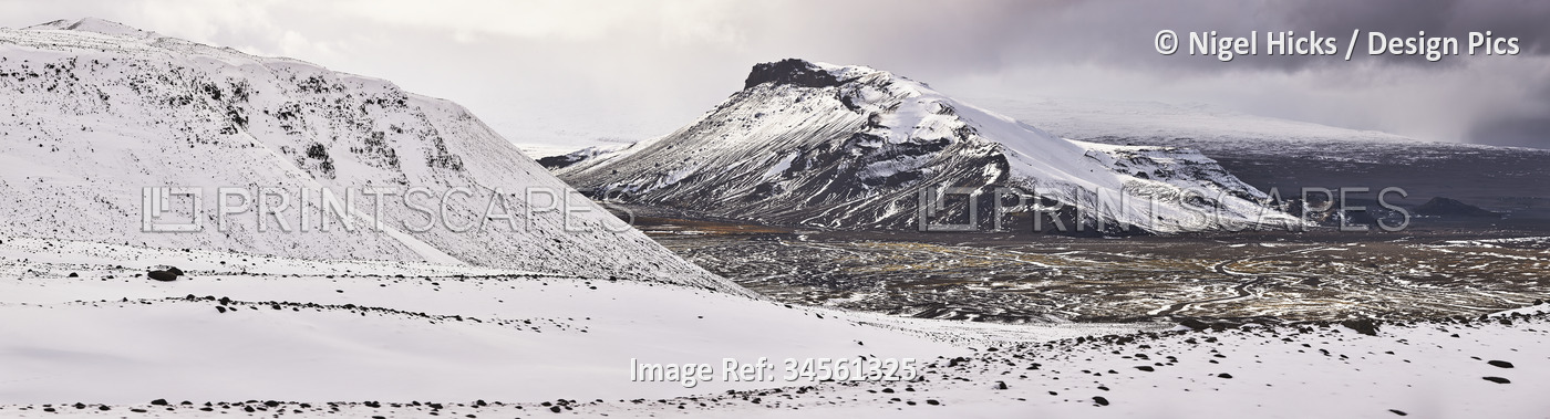 Snow-clad mountains in early winter in the Kaldidalur Valley, seen from ...