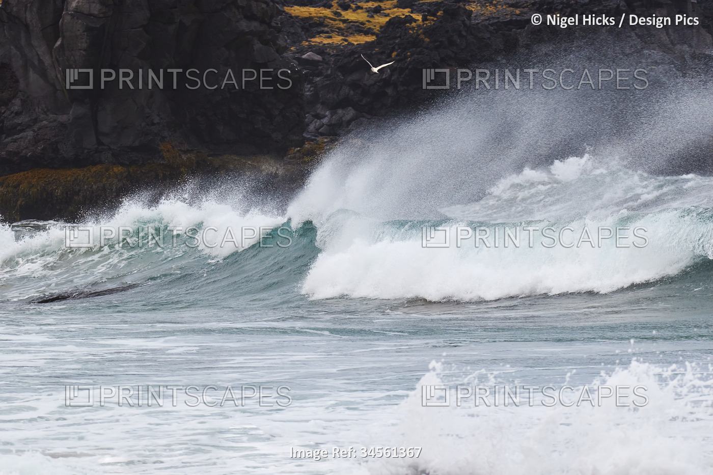 Surf at Skardavik, at the northwestern end of the Snaefellsnes peninsula, ...