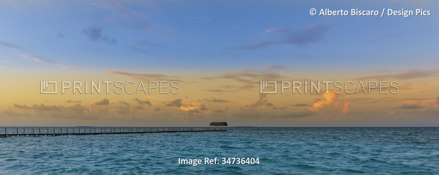 View of the ocean and a jetty off the beach of a resort in Cayo Guillermo at ...